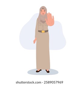 female thai muslim teacher in government uniform making stop hand gesture.  with stop hand symbol 