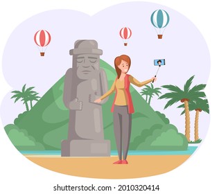 Female tourist travels, takes selfie near stone figure. Woman in journey on tropical island with palm trees and hot air balloons in mountaines summer vacation tourism leisure. Traveling by landmarks