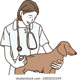 Female veterinarian giving a vaccine and injection to a dog
