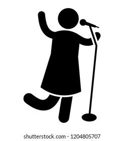 Female vocalist singing song holding mic 