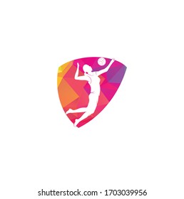 Female volleyball player shield shape concept logo.Abstract volleyball player jumping from a splash. Volleyball player serving ball.	
