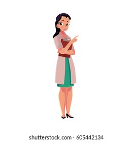 Female, woman doctor in a medical coat holding clipboard, pointing to the right, cartoon vector illustration isolated on white background. Full length portrait of female doctor with clipboard