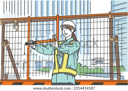 Female worker guarding at the construction site
