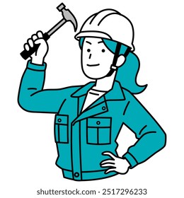 Female worker holding a hammer