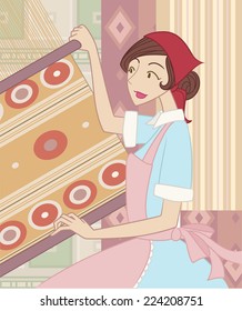 Female worker making fabric the old fashion way.