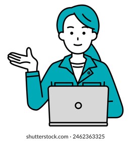 A female worker working on a laptop introduced with his right hand