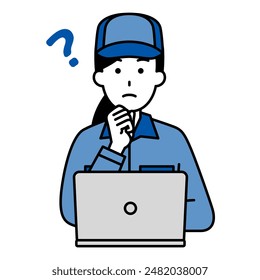 Female worker working on a laptop thinking of ideas