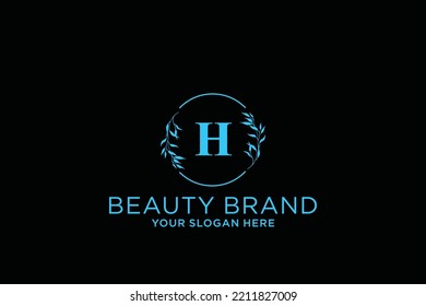 feminine floral letter H. beautiful caligraphic monogram flourish leaf boutique logo vector template stock illustration
