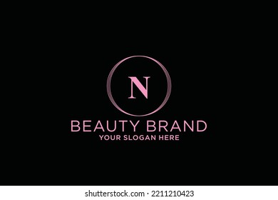 feminine floral letter N. beautiful caligraphic monogram flourish leaf boutique logo vector template stock illustration

