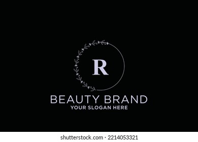 feminine floral letter R. beautiful caligraphic monogram flourish leaf boutique logo vector template stock illustration
