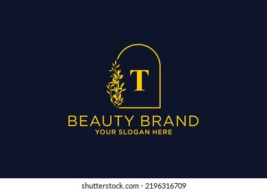 feminine floral letter T. beautiful caligraphic monogram flourish leaf boutique logo vector template stock illustration
