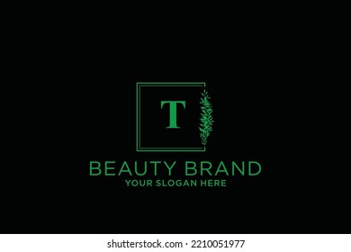 feminine floral letter T. beautiful caligraphic monogram flourish leaf boutique logo vector template stock illustration
