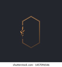 Feminine logo in black, gold