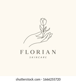 Feminine Vector Signs or Logo Template. Hand with Flower Illustration.