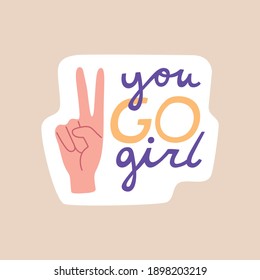 Feminist sticker with motivation slogan you go girl, female hand with symbol of feminism. Women's rights concept in trendy flat cartoon style, colorful vector illustration isolated on white background