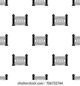 A fence of metal and bricks. A different fence single icon in black style vector symbol stock illustration web.