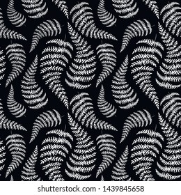 Fern backdrop. Hand drawn seamless pattern with sketch style fern branch. White on black, vector background.
