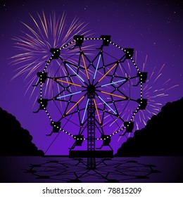 Ferris wheel at night with fireworks display