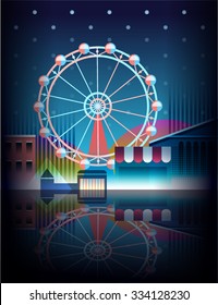 Ferris wheel and theme park on a winter night