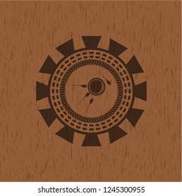 fertilization icon inside badge with wood background