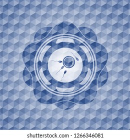 fertilization icon inside blue emblem or badge with abstract geometric polygonal pattern background.
