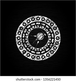 fertilization icon inside chalkboard emblem on black board