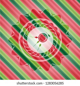 fertilization icon inside christmas colors style badge.