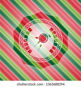 fertilization icon inside christmas colors style emblem.