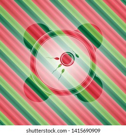fertilization icon inside christmas colors style emblem.