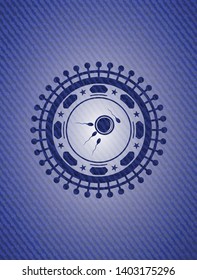 fertilization icon inside emblem with jean background