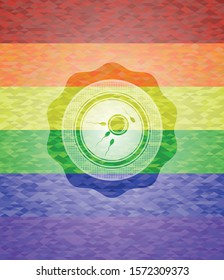 fertilization icon inside emblem on mosaic background with the colors of the LGBT flag