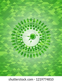 fertilization icon inside green emblem with triangle mosaic background