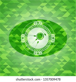 fertilization icon inside green emblem. Mosaic background