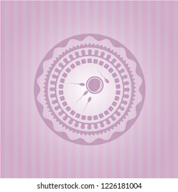 fertilization icon inside pink emblem