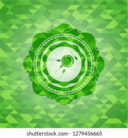 fertilization icon inside realistic green emblem. Mosaic background