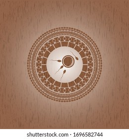 fertilization icon inside realistic wood emblem