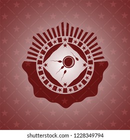 fertilization icon inside red emblem