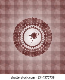 fertilization icon inside red seamless badge with geometric pattern background.