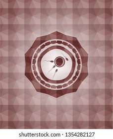 fertilization icon inside red seamless emblem or badge with abstract geometric polygonal pattern background.