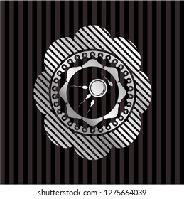 fertilization icon inside silver emblem or badge