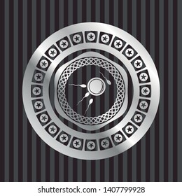 fertilization icon inside silvery emblem or badge