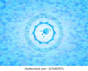fertilization icon inside sky blue emblem with triangle mosaic background