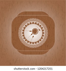fertilization icon inside wood emblem