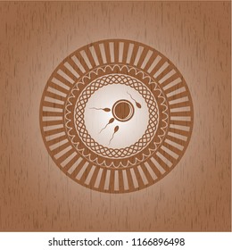 fertilization icon inside wooden emblem