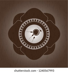 fertilization icon inside wooden emblem. Vintage.