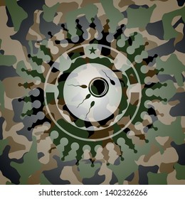 fertilization icon on camouflage texture