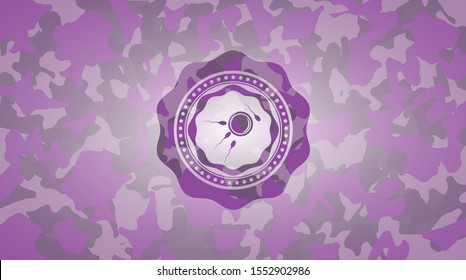 fertilization icon on pink camouflaged texture