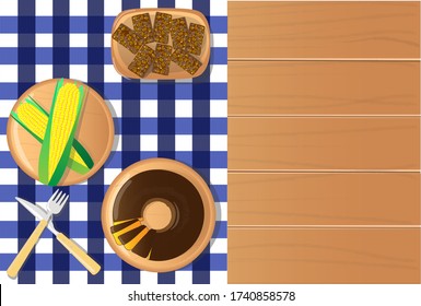 festa junina food table with green corn, carrot cake and sweet kidney top view