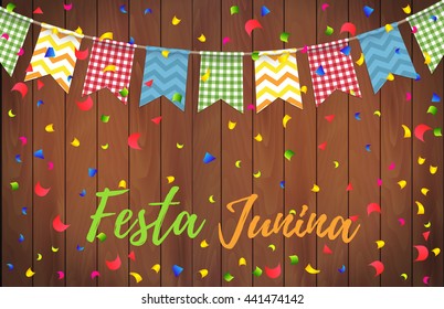 Festa Junina party greeting design. Poster of Brazil Festival. Folklore holiday. June summer party with colored beautiful garland and confetti on the wood background. Vector illustration. 