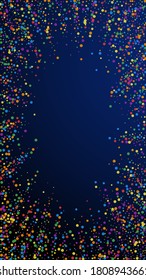 Festive artistic confetti. Celebration stars. Rainbow confetti on dark blue background. Favorable festive overlay template. Vertical vector background.